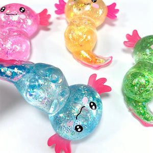 Writing  Cute Axolotl Squishy Toy – Glitter Stress Relief Fidget