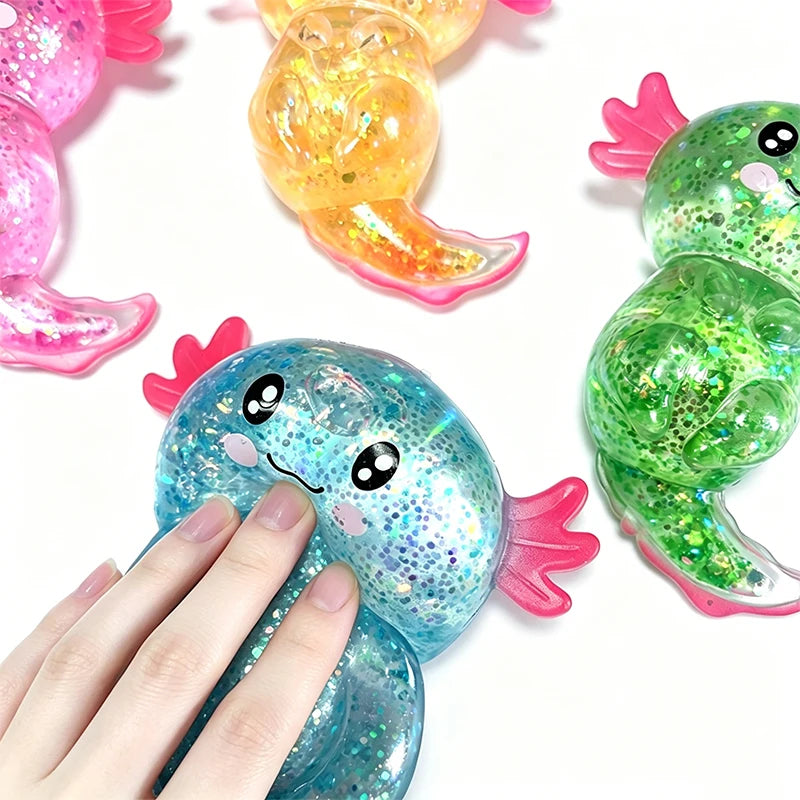 Writing  Cute Axolotl Squishy Toy – Glitter Stress Relief Fidget